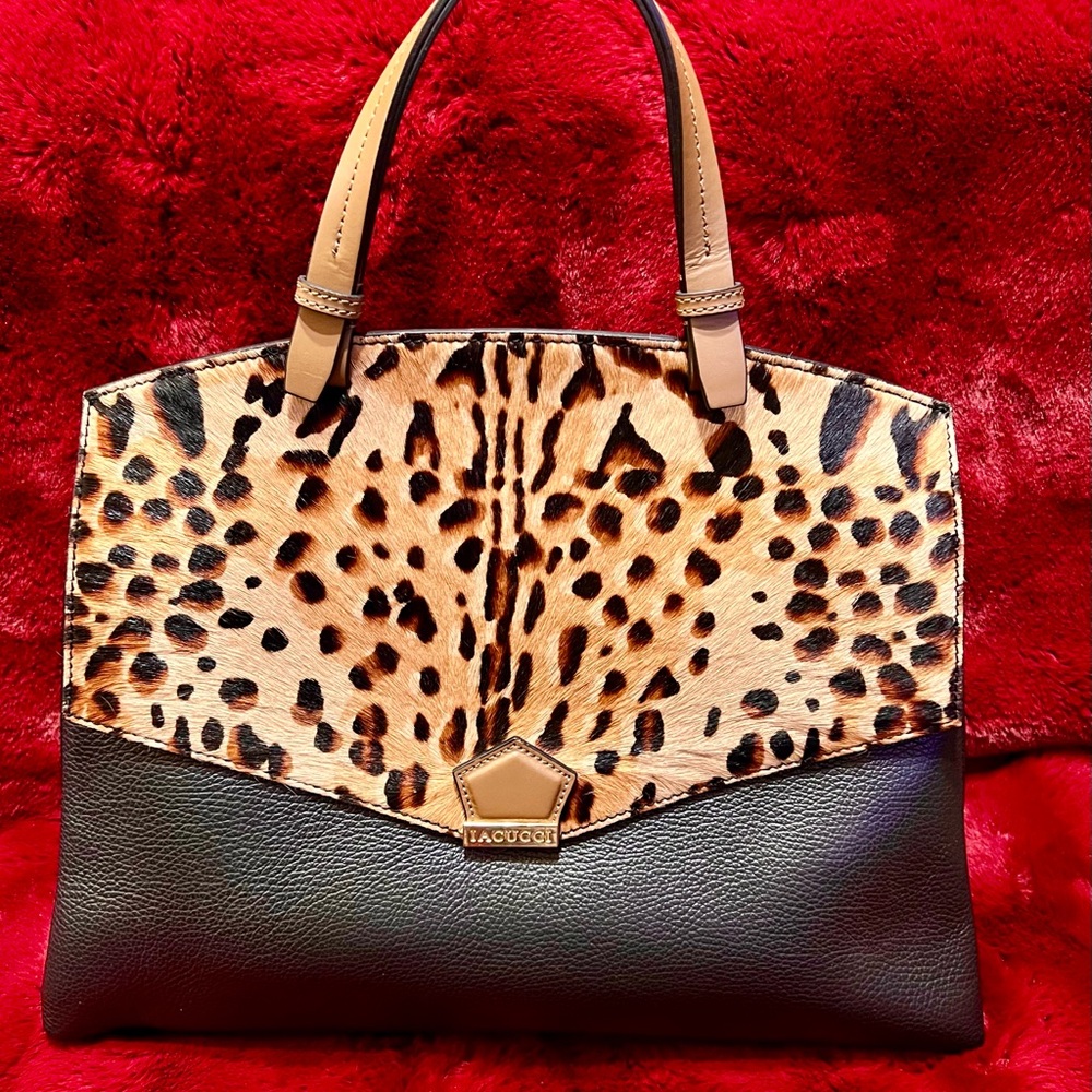 Animal print, black leather handbag
